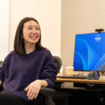 Employee sitting at desk.